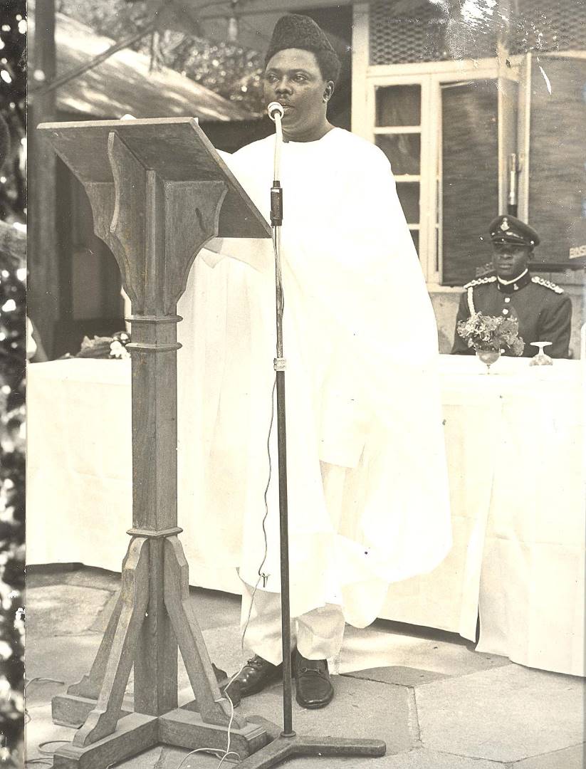 General Murtala Muhammed speaking at a podium